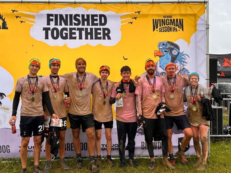 Local company raises more than £5,000 for Cancer Research UK in gruelling Tough Mudder challenge